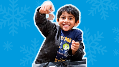 kID HOLDS UP CAMP CREATION AT SCIENCE MUSEUM OKLAHOMA