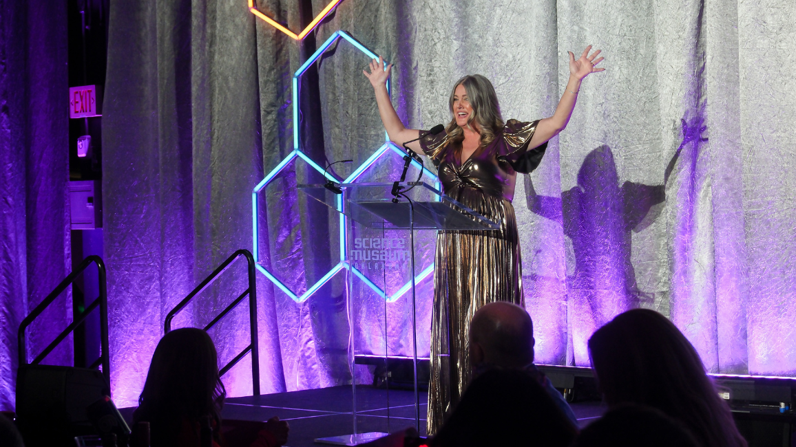 A guest explores fundraising opportunities at Elemental Ball at Science Museum Oklahoma