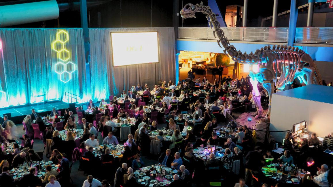 A guest explores fundraising opportunities at Elemental Ball at Science Museum Oklahoma
