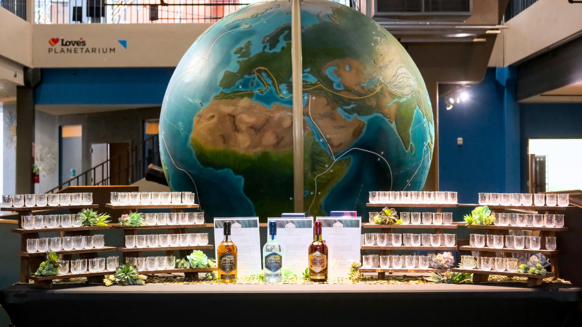 A guest explores fundraising opportunities at Elemental Ball at Science Museum Oklahoma