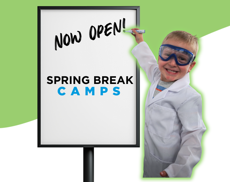 Boy writes oon white board talking about camps at science museum oklahoma