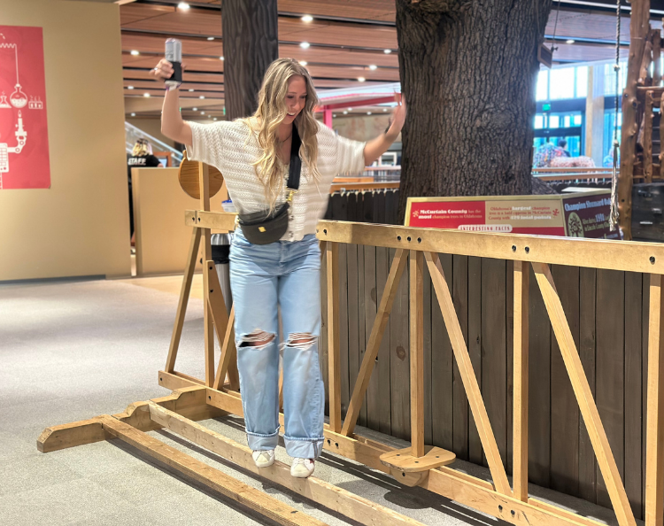 SMO21+ Homepage CTA woman walking on beam