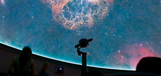 Guests view a breathtaking projection of deep space during a show at the Love’s Planetarium at Science Museum Oklahoma.