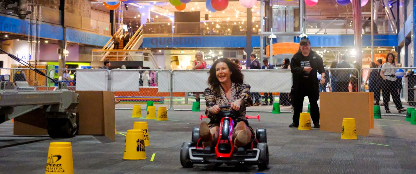 A women enjoys her time while experiencing an event at Science Museum Oklahoma in a go-cart in Oklahoma City.