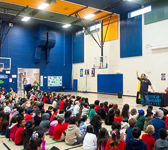 Oklahoma elementary students gathered in a school gym for a live science demonstration by Science Museum Oklahoma’s STEAM Live outreach program.
