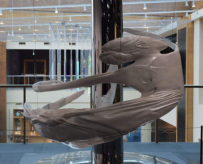 A contemporary sculpture floats above the second floor in smART Space at Science Museum Oklahoma, where art and science intersect through rotating exhibits.