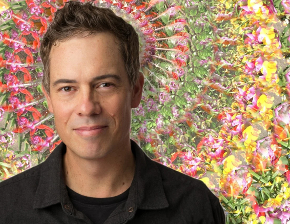 Image of Eric Dyer with colorful spiral background