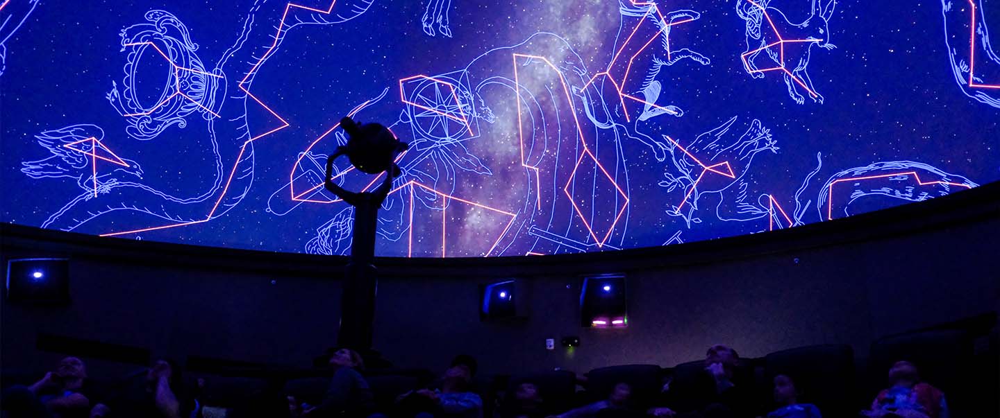 Visitors experience a constellation show inside Love’s Planetarium at Science Museum Oklahoma