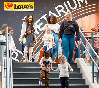 Many families exiting an exciting show in Love’s Planetarium at Science Museum Oklahoma.