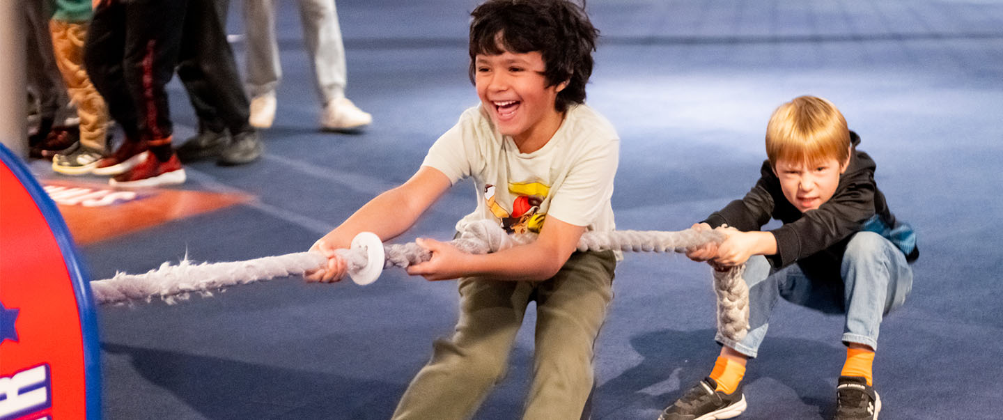 Kids playing tug-o-war at the Science Museum in OKC
